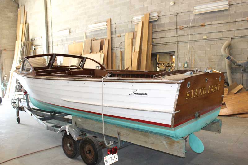 Stand Fast, a 1959 19-foot Lyman inboard utility boat in the shop at Phipps Boat Works in Deale, MD. Photo by Rick Franke