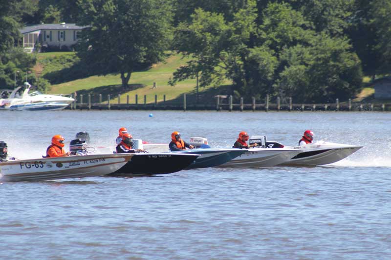 Classic boats race just off the Leonardtown Wharf . Photo by John Nepini, Southern Maryland Boat Club