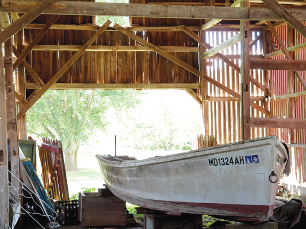 The deadrise skiff as he found her in an Eastern Shore barn.