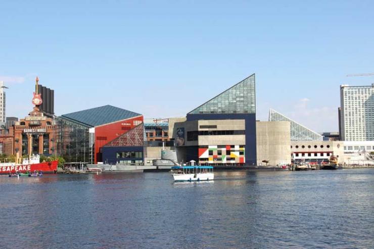 There's plenty to see and do in Baltimore's Inner Harbor, including the National Aquarium (Pictured center).