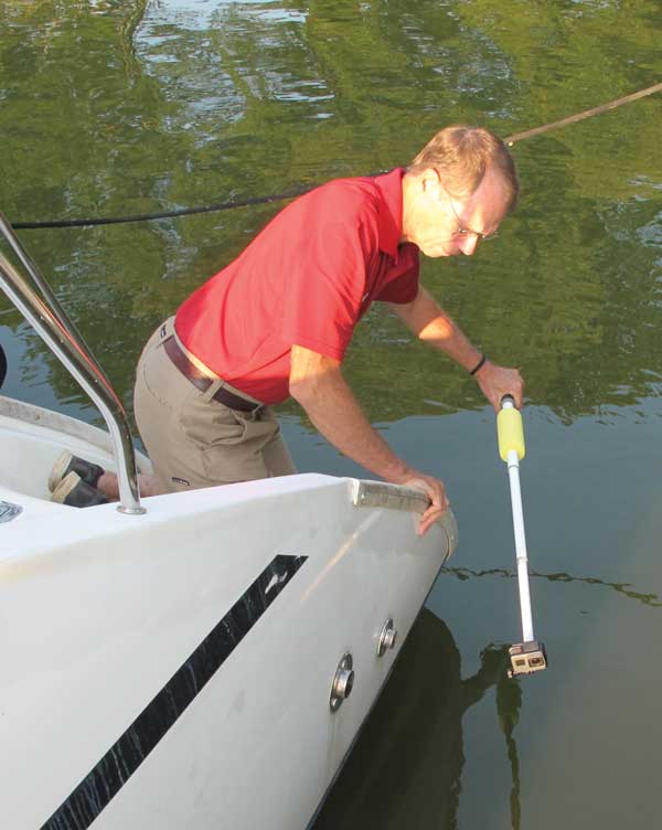 An underwater camera mounted on a boat hook can you allow you to check for damage or marine growth while the boat is still in the water.