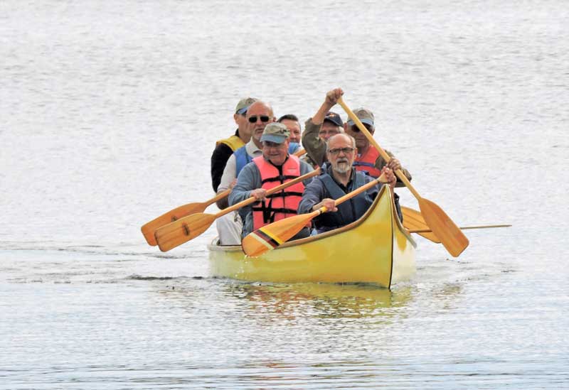 How many volunteers can paddle a big canoe? At least seven in this 25-foot 1960 Old Town Camp Canoe restored by the Patuxent Small Craft Guild at Solomons, MD.