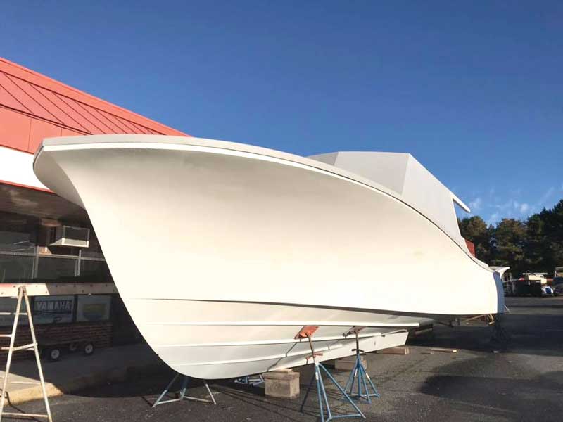The new custom CY46 moves out of the molding shop for completion of her interior at Composite Yacht in Trappe, MD.