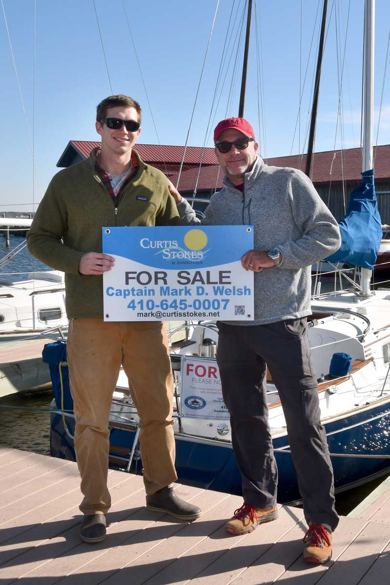 The Chesapeake Bay Maritime Museum in St. Michaels, Md. has recently announced the formation of a new, preferred partnership with Curtis Stokes & Associates, represented here by broker Mark Welsh, left, standing with CBMM Charity Boat Donation Program Director Taylor Williams