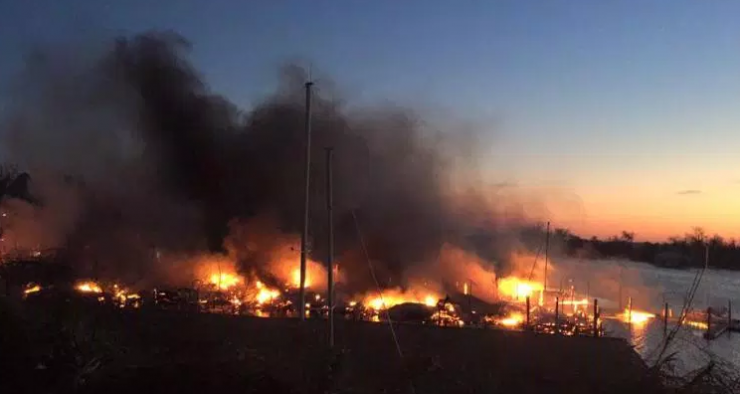 Photo by Beth Justice. Justice lives near the marina and called 911 when she saw the flames from her home.