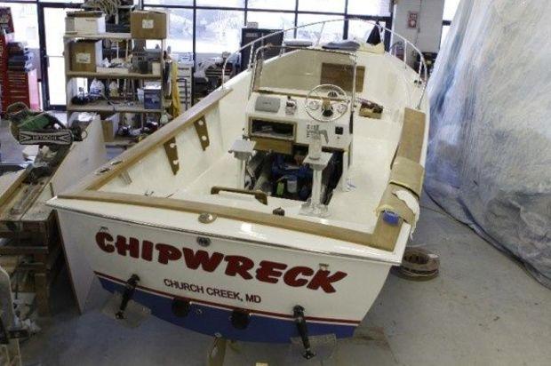E-mail gary@proptalk.com if you know the make and model of this pretty center-console. Photo by Gary Reich