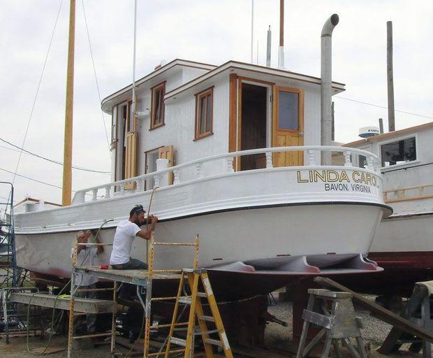 Linda Carol is a 1931 buyboat being restored by Dave Rollins at York Haven Marina in Poquoson, VA. Note the dry stack exhaust and the squat boards under her stern.