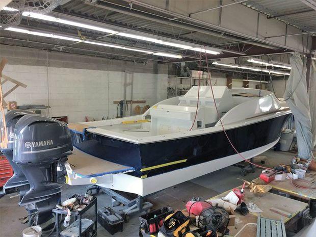 Construction nears completion on a twin Yamaha 350s outboard powered CY34 Express at Composite Yacht in Trappe, MD.