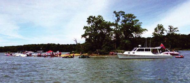 The West-Rhode Riverkeeper has requested boaters to not beach their boats on Flat Island in the Rhode River but rather raftup nearby. Photo by Jeff Holland