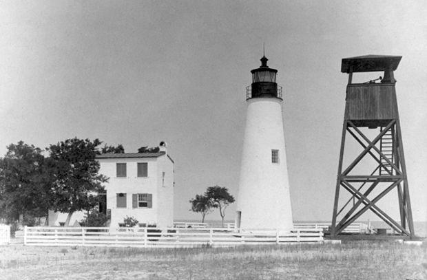 The Keeper's Dwelling, lighthouse, and fog bell tower (L to R) in 1828. Photo courtesy U.S. Coast Guard