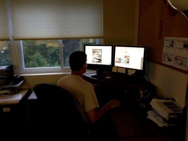 Production artist Zach Ditmars works away tirelessly while putting the finishing touches on the September issue of PropTalk. Photo by Gary Reich