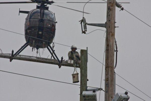 High-voltage maneuvers above Kent Island on Thursday.<br />Photo by Gary Reich